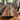 Wooden table crafted from black walnut wood with dual power outlets and a striking black resin channel, ideal for conference rooms and executive desks - BespokeTableCo