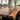 Epoxy table featuring black walnut wood, a flowing black resin inlay, and integrated power connectivity for seamless productivity - BespokeTableCo