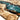 Luxury epoxy table featuring a poplar wood surface with unique natural grain, artistic resin inlays, and a modern design for a stylish dining area ---- BespokeTableCo