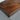 Detailed view of black walnut wood texture and white resin river design on a handcrafted solid wood dining table with premium epoxy craftsmanship - BespokeTableCo