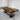 Black walnut epoxy conference table exhibited in a professional showroom, highlighting the straight edge with softly rounded corners, full glossy finish, and premium wood grain - BespokeTableCo