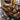 Custom epoxy resin black walnut dining table creating a luxury dining space with a  wood table top and handcrafted epoxy table surface - BespokeTableCo