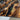 Custom epoxy resin black walnut dining table detail revealing the contrast between live edge dining table wood character and deep resin table effects - BespokeTableCo