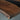 Premium epoxy resin black walnut dining room table detail highlighting the glossy resin resin and unique natural wood patterns across the table top - BespokeTableCo