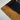 Custom epoxy resin black walnut dining table detail showing rich walnut grain across the wood table top with a smooth epoxy table inlay - BespokeTableCo