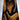 Custom epoxy resin black walnut dining table detail featuring a glossy finish on the wood table top and handcrafted epoxy table surface - BespokeTableCo
