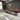 Custom epoxy resin black walnut dining table showcase featuring natural walnut textures, live edge dining table styling, and a statement resin table surface - BespokeTableCo