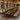 Custom epoxy resin black walnut dining table styled in a modern interior showcasing organic live edge dining table character and artistic resin table craftsmanship - BespokeTableCo