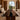 Custom epoxy resin black walnut dining table used as a solid wood dining table in a modern home office with a black epoxy table river design - BespokeTableCo