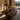 Custom epoxy resin black walnut dining table styled as a premium solid wood dining table with a handcrafted epoxy table finish in a luxury room - BespokeTableCo