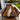 Custom epoxy resin black walnut dining table used as a premium wood dining table in a luxury outdoor patio with a handcrafted resin table river design - BespokeTableCo