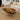 Custom epoxy resin burl cedar coffee table with natural burl wood texture and flowing resin accents, creating a statement unique coffee table for contemporary lounge spaces and coffee table wooden coffee table interiors - BespokeTableCo