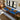 Custom epoxy resin Burl Cedar kitchen countertops showcasing warm wood slabs for countertops with a vibrant blue epoxy table surface in a contemporary home - BespokeTableCo