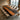 Olive wood epoxy conference table with integrated power outlets in a luxury boardroom setting, showcasing functional conference room tables and handcrafted resin table design - BespokeTableCo