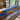Custom epoxy resin golden camphor kitchen countertops creating a luxury cooking space with natural wood slabs for countertops and a flowing epoxy table resin effect - BespokeTableCo