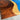 Close-up of custom epoxy resin walnut dining table showing detailed walnut wood grain, beveled edge craftsmanship, and glossy resin finish for a premium solid wood dining table and resin table - BespokeTableCo