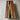 A wood slabs for countertops display featuring walnut with black resin inlay, showcased in a bright studio setting for kitchen design presentation - BespokeTableCo