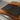 Detailed view of olive wood epoxy conference table edge and glossy resin surface, highlighting handcrafted quality for modern conference room tables - BespokeTableCo
