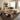 Round resin walnut coffee table placed in a modern living room with a beige sofa and elegant interior design, featuring a handcrafted wooden coffee table top - BeSpokeTableCo