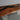 Custom furniture workshop display featuring a walnut dining table with glossy epoxy resin finish and solid wood dining table construction - BeSpokeTableCo