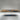 Custom Olive Epoxy Resin Dining Table exhibition view featuring warm olive wood tones and vibrant resin inlay, a premium solid wood dining table and epoxy table for modern homes - BespokeTableCo