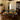 Wood dining table crafted from burl cedar with a custom epoxy resin top, creating a unique centerpiece for luxury home interiors - BespokeTableCo