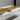 Handcrafted solid wood dining table production featuring poplar wood selection, resin filling, and professional surface finishing for a custom dining room table - BespokeTableCo