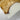 Poplar resin dining table detail featuring polished resin edges, organic wood patterns, and refined finishing for an elegant dining room table design - BespokeTableCo