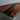 Detailed shot of custom walnut dining table with refined epoxy resin inlay and premium solid wood dining table finish - BeSpokeTableCo