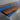 Modern walnut dining table display featuring natural live edge wood details, blue epoxy resin inlay, and a handcrafted dining room table design - BeSpokeTableCo
