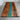 Craftsman polishing a black walnut wood top table countertop with epoxy resin details during the handmade kitchen island production process - BespokeTableCo