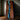 Midnight Tide epoxy resin with North American Black Walnut, creating dramatic live edge river tables for executive boardrooms and luxury residences.