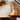 Solid wood dining table featuring a  edge walnut slab and crystal-clear resin, perfect for creating a warm, inviting atmosphere in any dining room - BespokeTableCo